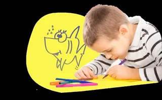 A child drawing a cartoon