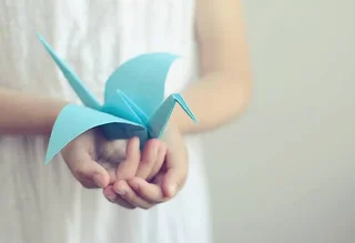 A folded paper crane
